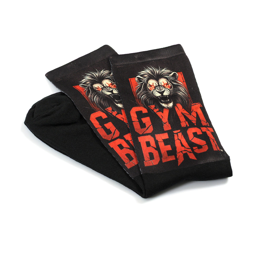 Забавни чорапи за фитнес – "Gym Beast" с илюстрация на лъв и надпис GYM BEAST, символизиращи сила и увереност.